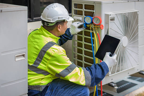 Professional Hvac Maintenance technician working in Helenville, WI